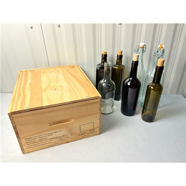 wooden Achaval Ferrer wine box with fermenting bottles, more bottles in wooden box