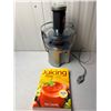 Image 1 : Breville Juicer used once,  and The Juicing Bible by Pat Crocker