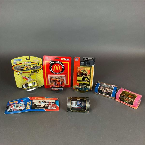 Assortment of Seven NASCAR and NFL Die-Cast Model Cars