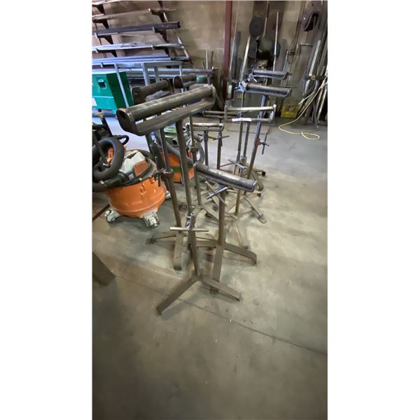 GROUP OF APPROX 10 METAL MATERIAL ROLLER STANDS