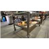 Image 2 : METAL FRAMED 2 TIER WOOD TOP MOBILE SHOP TABLE WITH SHEET METAL COVER APPROX 60"L X 36"D X 34"H