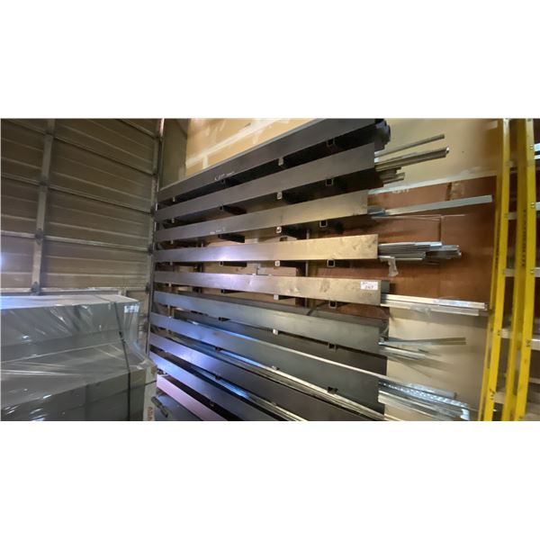METAL STOCK STORAGE RACK WITH ASSORTED METAL CONTENTS- MOSTLY CLEATS