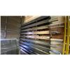 Image 1 : METAL STOCK STORAGE RACK WITH ASSORTED METAL CONTENTS- MOSTLY CLEATS