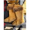 Image 1 : Several pieces of handmade winterwear: MOOSE HIDE LEATHER mittens lined with fleece, a pair of tall 