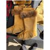 Image 2 : Several pieces of handmade winterwear: MOOSE HIDE LEATHER mittens lined with fleece, a pair of tall 