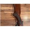 Image 10 : Cooey  model 34 single barrel shotgun featuring a wooden stock and blued metal receiver. The receive
