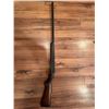 Image 1 : Cooey  model 34 single barrel shotgun featuring a wooden stock and blued metal receiver. The receive