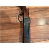 Image 8 : Cooey  model 34 single barrel shotgun featuring a wooden stock and blued metal receiver. The receive