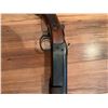 Image 9 : Cooey  model 34 single barrel shotgun featuring a wooden stock and blued metal receiver. The receive