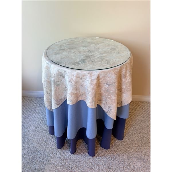 Round Table with Decorative Linens
