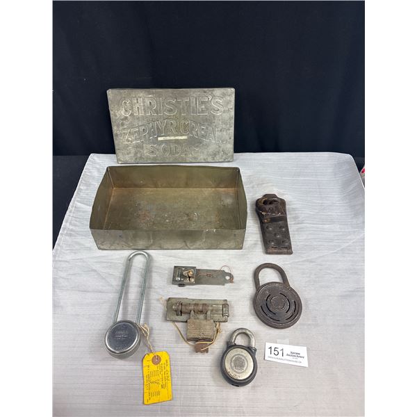 A Vintage Christies Embosed Tin Filled with Old Locks