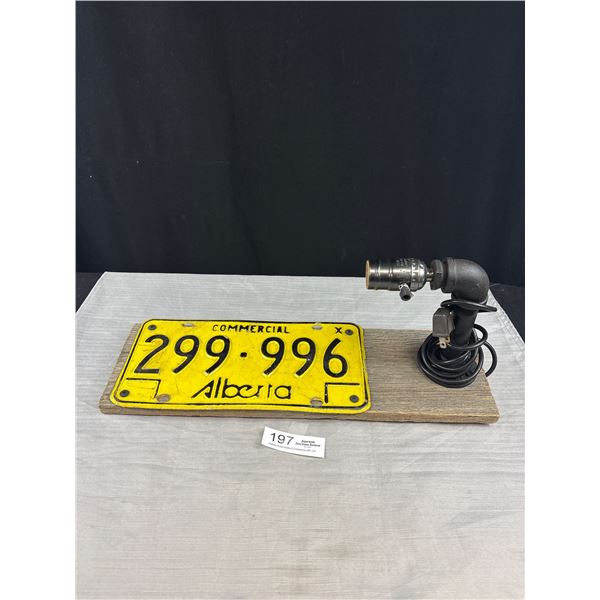 A steampunk Light with Alberta License Plate on Board