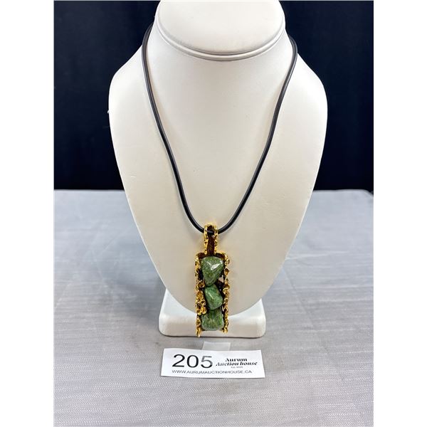 A Modernist/Brutalist Style Necklace with Green Stones in a Gold Tone Pendant