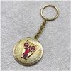 Image 1 : VINTAGE WISE IS THE WOMAN TT EYEWEAR KEYCHAIN