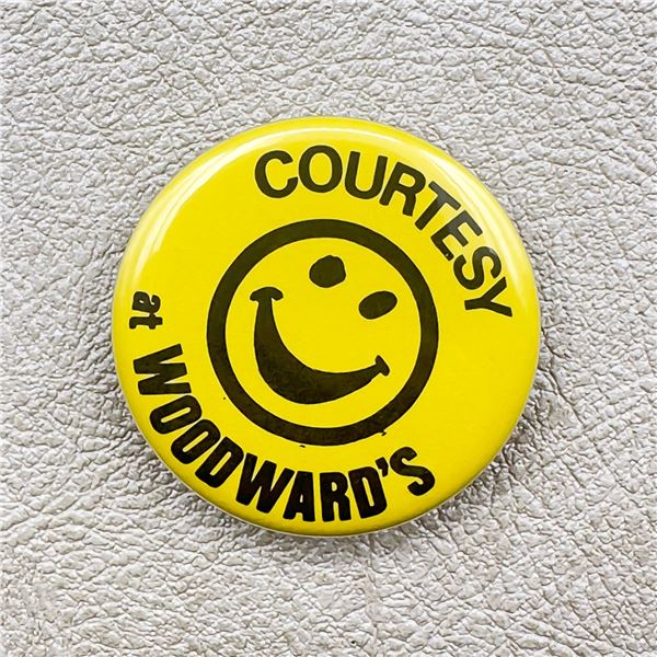 VINTAGE WOODWARD'S COURTESY SMILEY FACE PIN