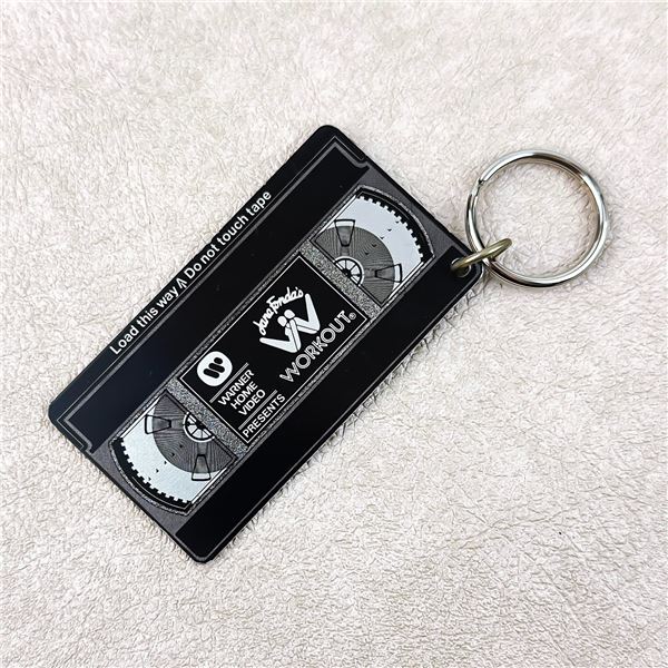 VTG JANE FONDA WORKOUT VHS KEYCHAIN - CALGARY