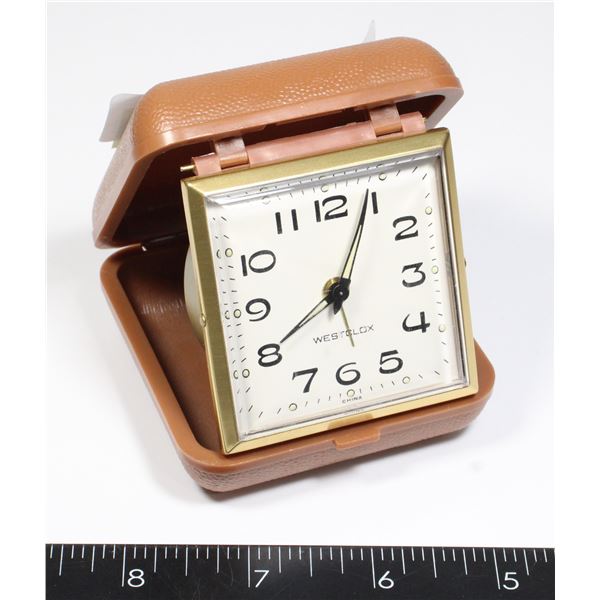 VINTAGE WESTCLOX TRAVEL ALARM CLOCK IN A FOLDING