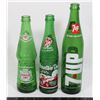 Image 1 : THREE VINTAGE BOTTLES MOUNTAIN DEW CANADA DRY 7UP