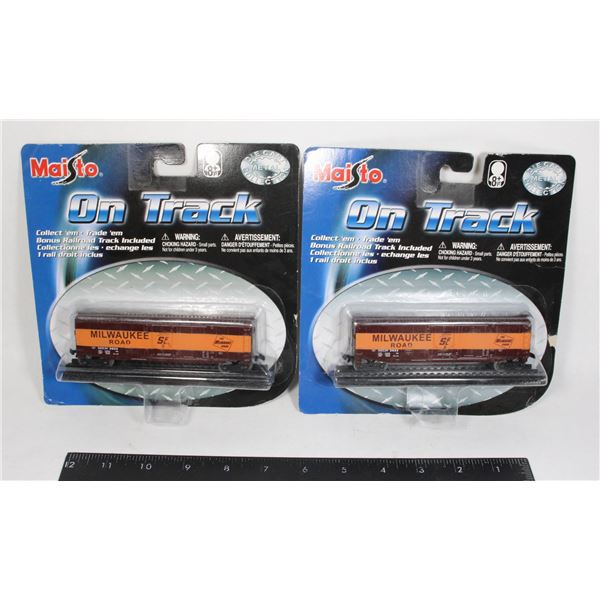 PAIR OF MAISTO DIECAST TRAIN CARS