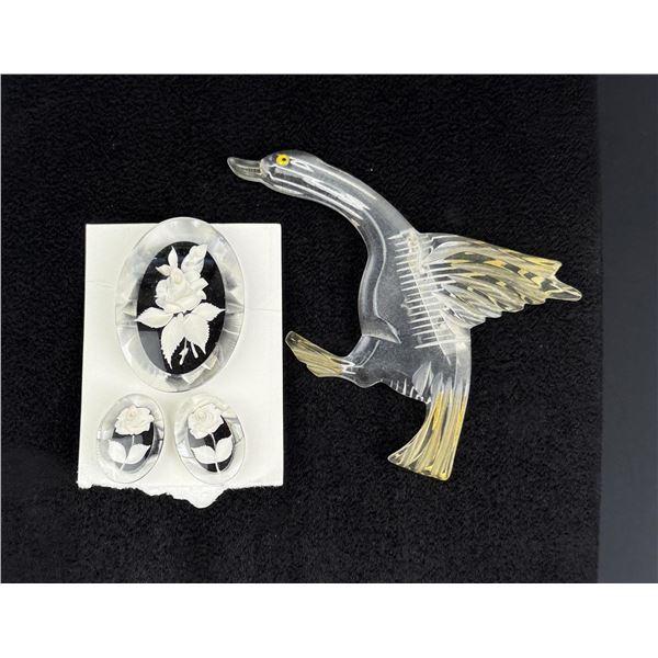 Lucite Flying Duck and Flower Brooches