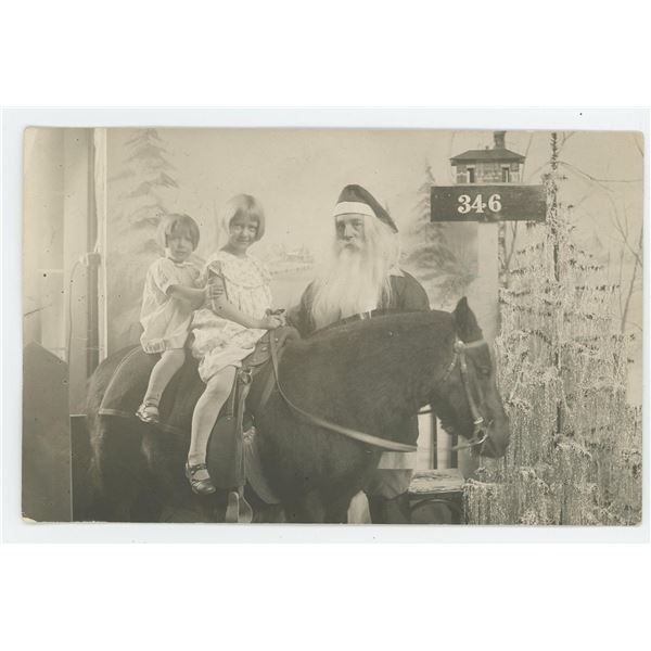 Cowboy Santa Claus Christmas RPPC Postcard