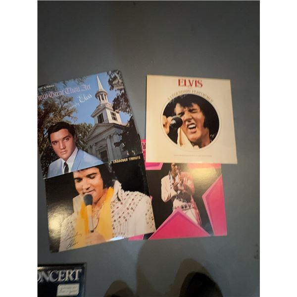Four Elvis Presley Vinyl Records