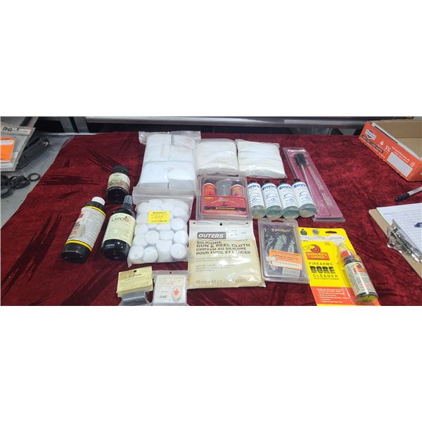 LARGE LOT OF FIREARM CLEANING SUPPLIES ,INCLUDING: FOUR BOTTLES OF ENVIRO SAVE, METAL TREATMENT, SHO