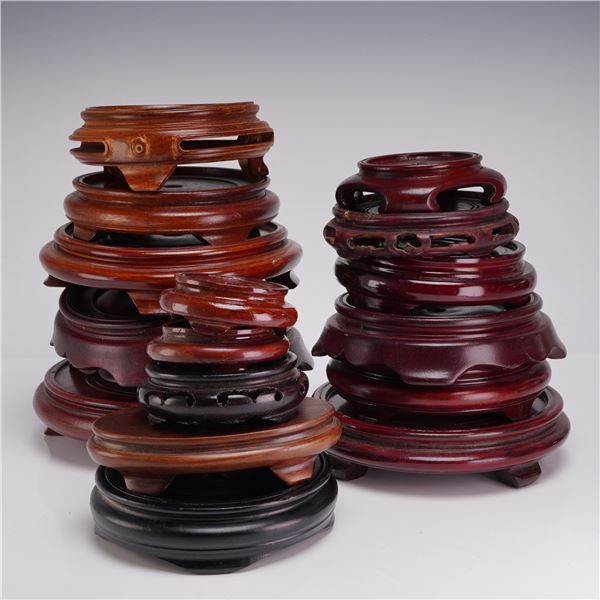 A Collection of 17 Wooden Chinese Display Bases