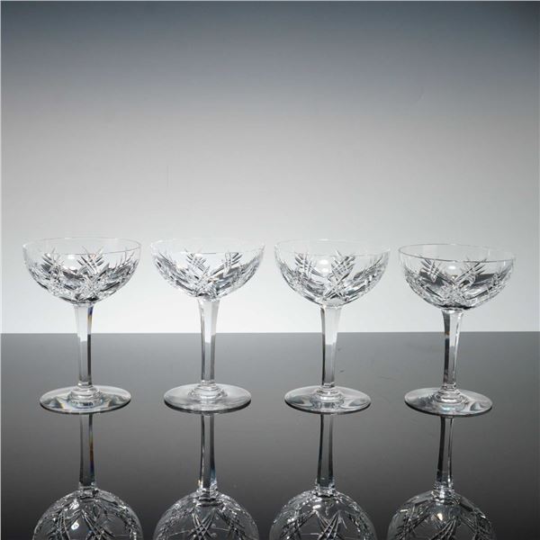 Set of four Baccarat Crystal Champagne Coupes, Auvergne Perigold