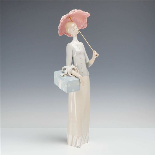 Lladro Porcelain Figurine, The Dressmaker 01004700