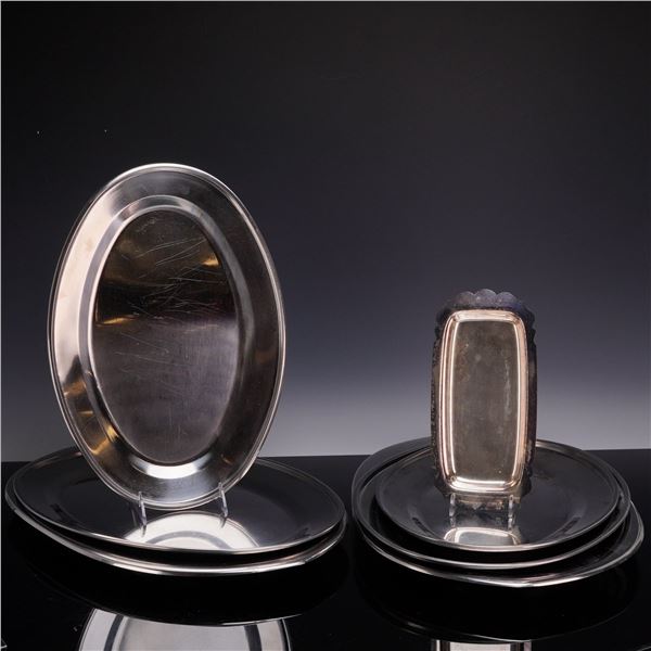 Set of 7 Stainless Steel Platters and a Scalloped Serving Dish