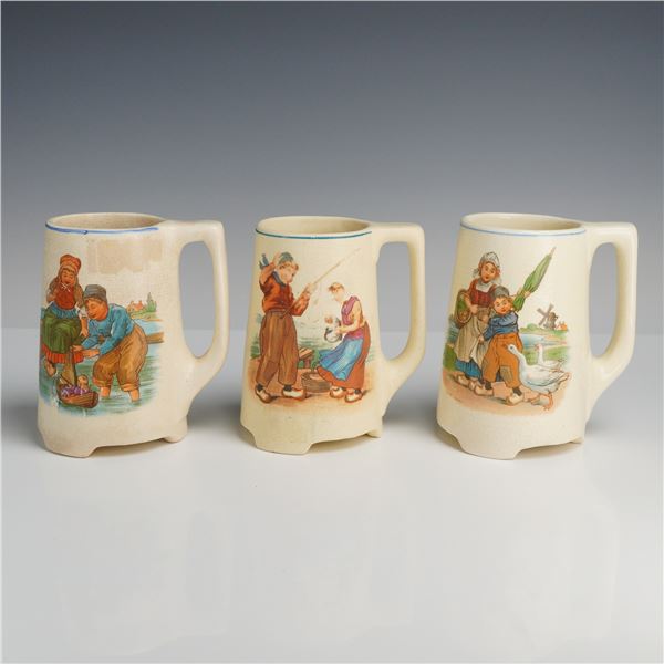 Roseville Pottery Creamware Dutch Children Mugs, Set of Three
