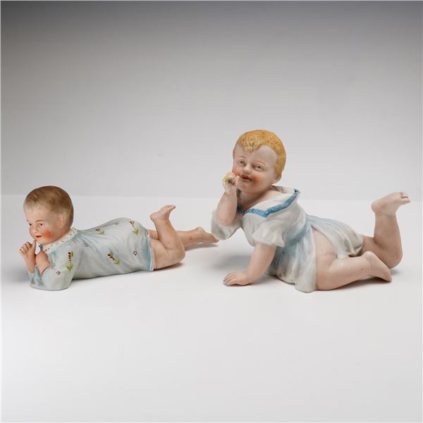 Two German Style Hand Painted Bisque Porcelain Piano Babies