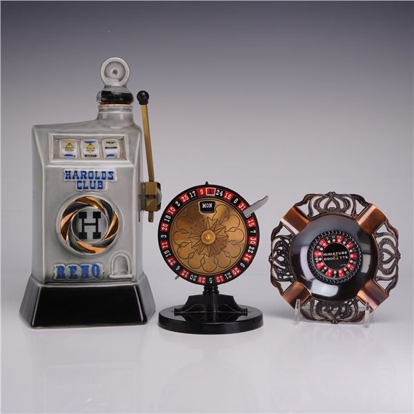 Three Vintage Gambling Themed Collectibles - Calendar, Ashtray & Decanter