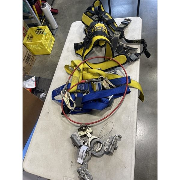 LOT OF SAFETY HARNESSES AND HOOKS