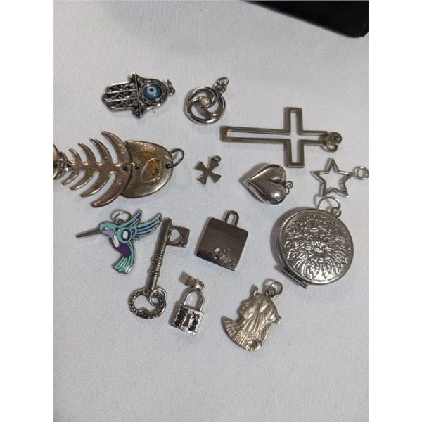 LOT OF VINTAGE SILVER TONE PENDANTS