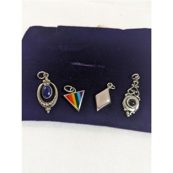 4 STERLING SILVER PENDANTS