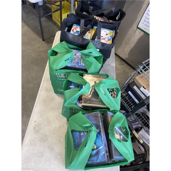 5 BAGS OF ASSORTED DVDS