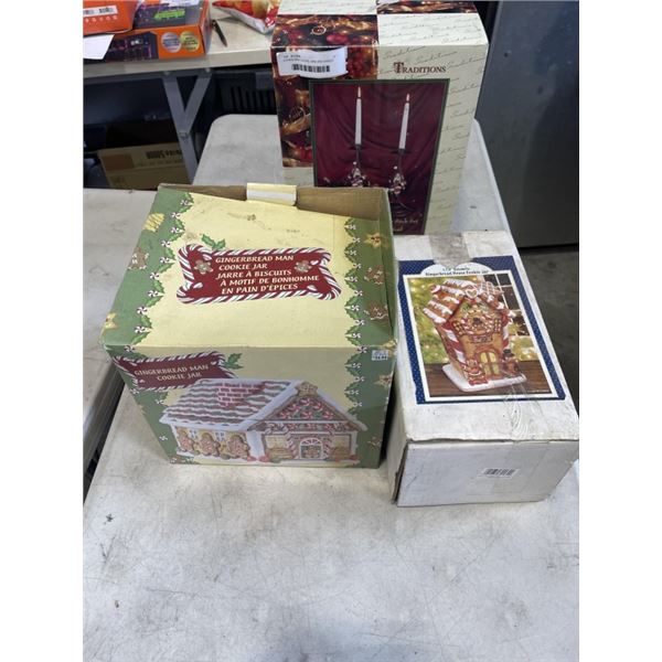 2 CHRISTMAS COOKIE JARS AND CANDLE STICKS
