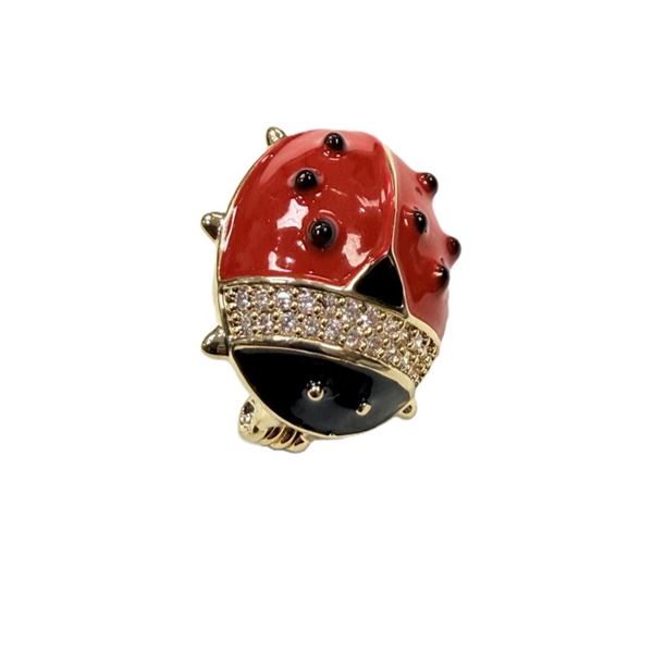 14KT GOLD ELECTROPLATED ON COPPER SYNTHETIC ZIRCONIA BROOCH.
