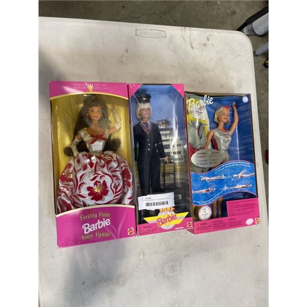 3 VINTAGE BARBIES IN ORIGNAL PACKAGE - 1999 SWIMMING CHAMPION, 1996 EVENING FLAME, AND 1999 PILOT BA