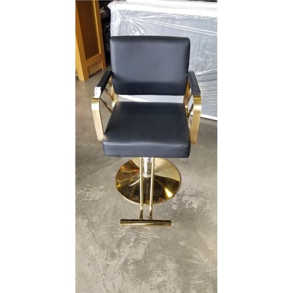 GOLD AND BLACK BARBERS CHAIR