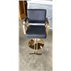 Image 1 : GOLD AND BLACK BARBERS CHAIR