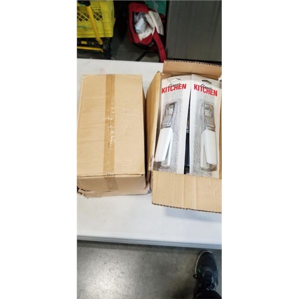 2 CASES NEW GARLIC PRESSERS. APPROX 24 UNITS