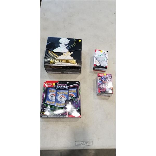 4 BOXES OF POKEMON CARDS 3 SEEM TOO BE OPEN ONE IS SEALED