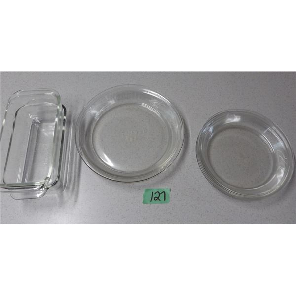 Lot of glass pie dishes and glass loaf pans