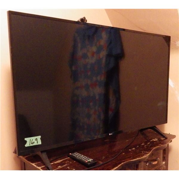 LG flat screen TV  - model 43LJ5000-UB