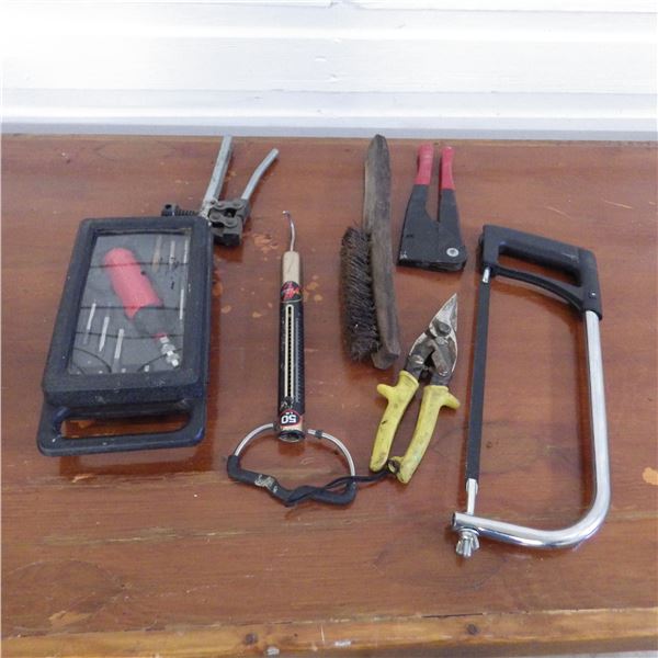 hacksaw , wire brush , chain break, etc