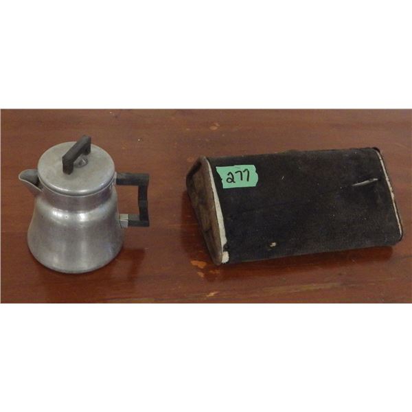 antique coffee pot and foot warmer