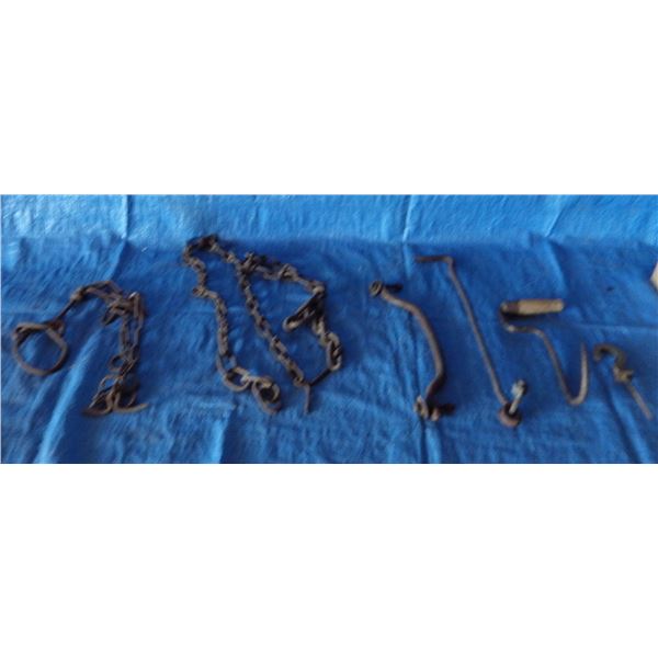 vintage cow stall chains, hay hook, and vintage cast decorative ceiling hook and items